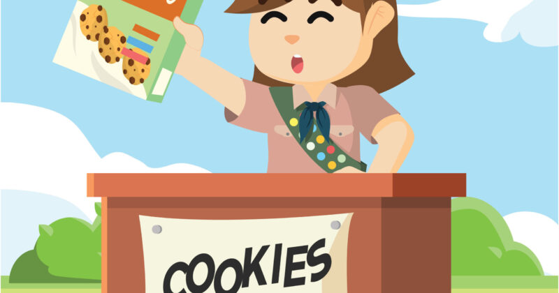 scout girl selling cookies